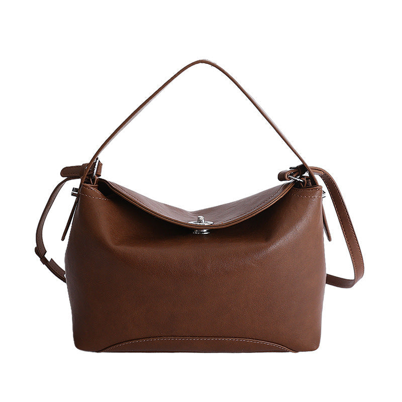 Women's handbag with flexible strap and elegant design
