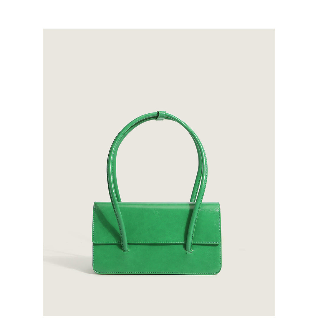 Ladies elegant handbag with minimalist silhouette