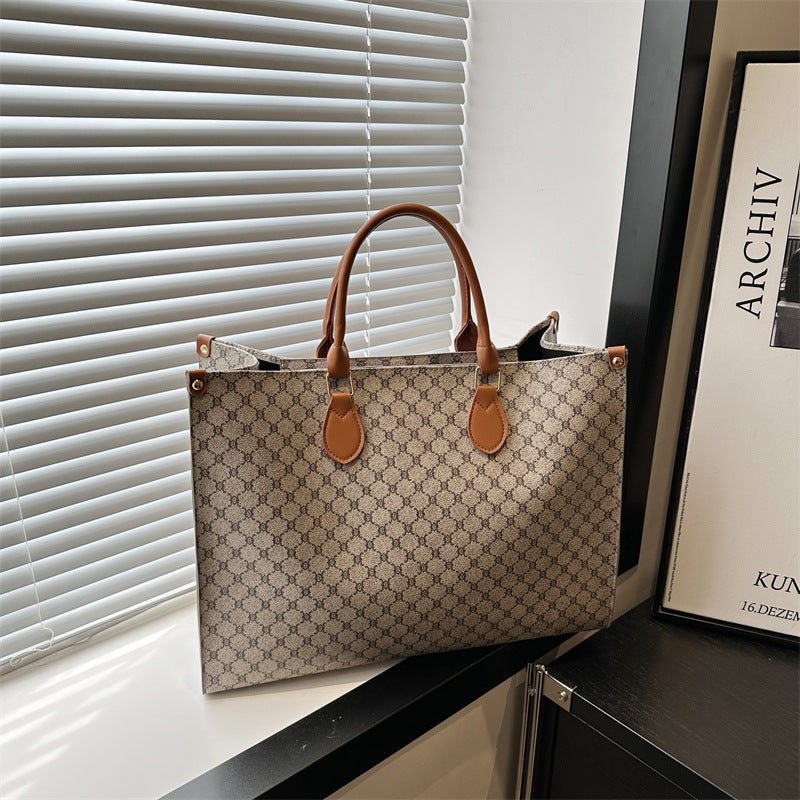 Women elegant tote bag with high-quality monogram design