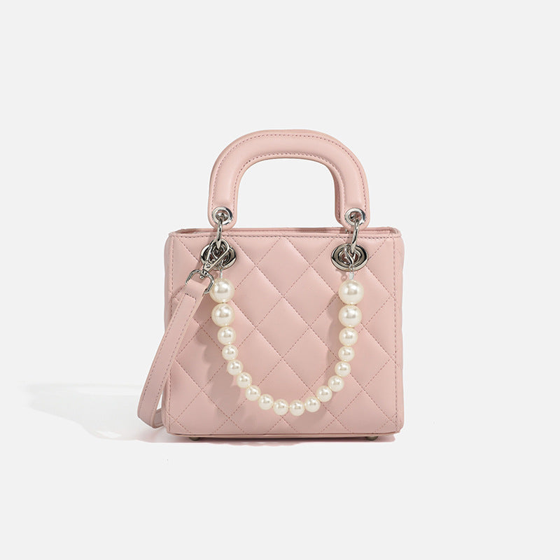 Ladies mini handbag with pearl-embellished chain and quilted design