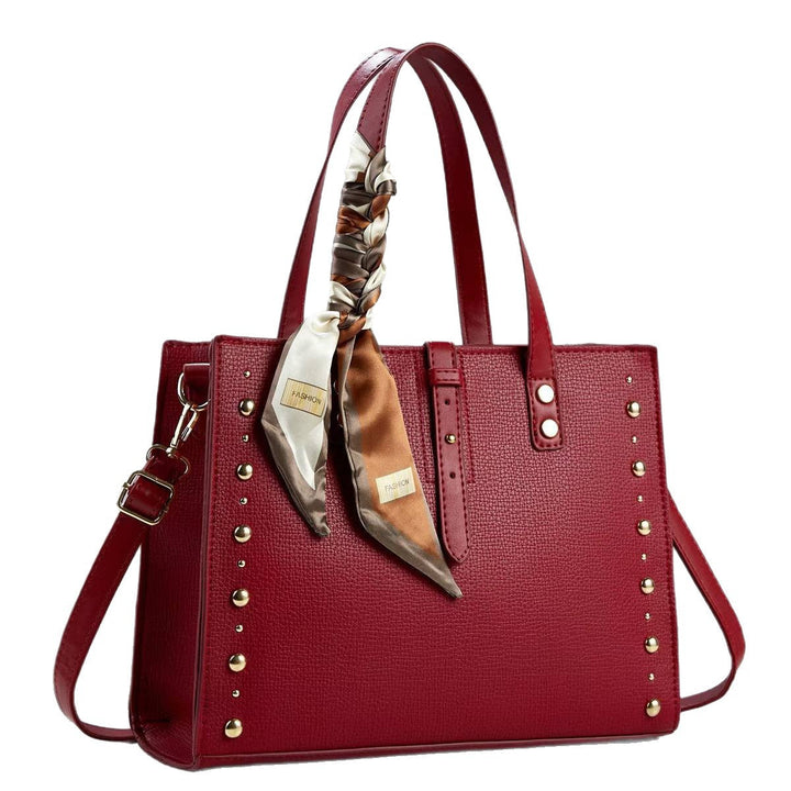 Ladies elegant tote bag with golden studs and fashionable scarf
