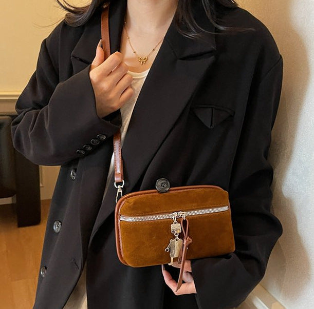 Women's practical shoulder bag made of high-quality suede leather