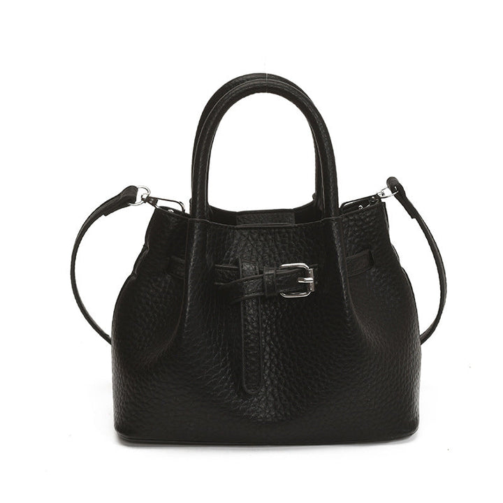 Women's mini handbag with stylish button closure