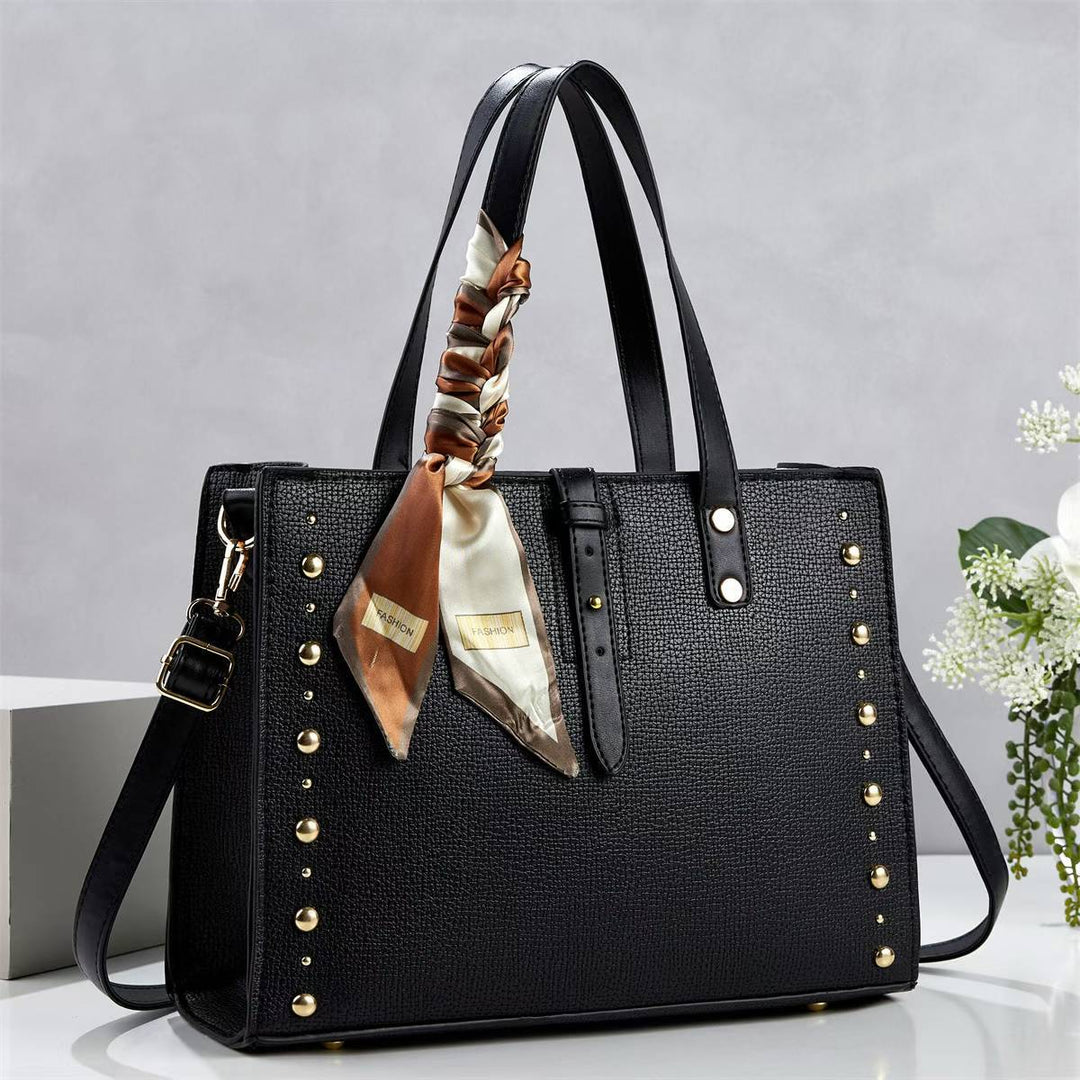 Ladies elegant tote bag with golden studs and fashionable scarf