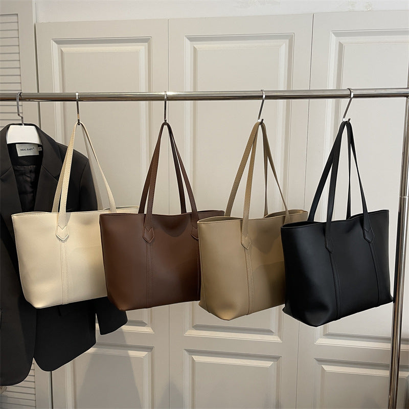 Women's elegant tote bag with minimalist structure