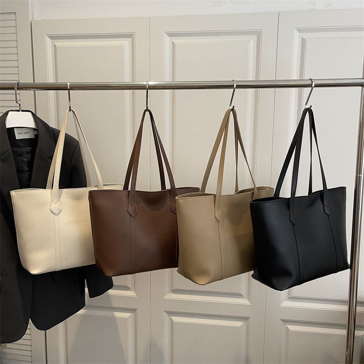 Women's elegant tote bag with minimalist structure