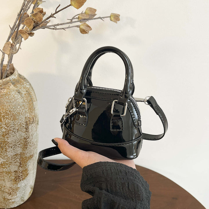 Women's mini handbag with glossy surface and fashionable zipper