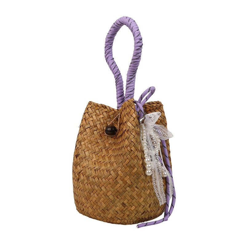 Women's hand-woven shoulder bag with decorative drawstring