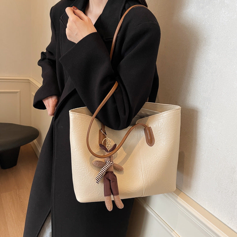 Ladies stylish tote bag with charming keychain