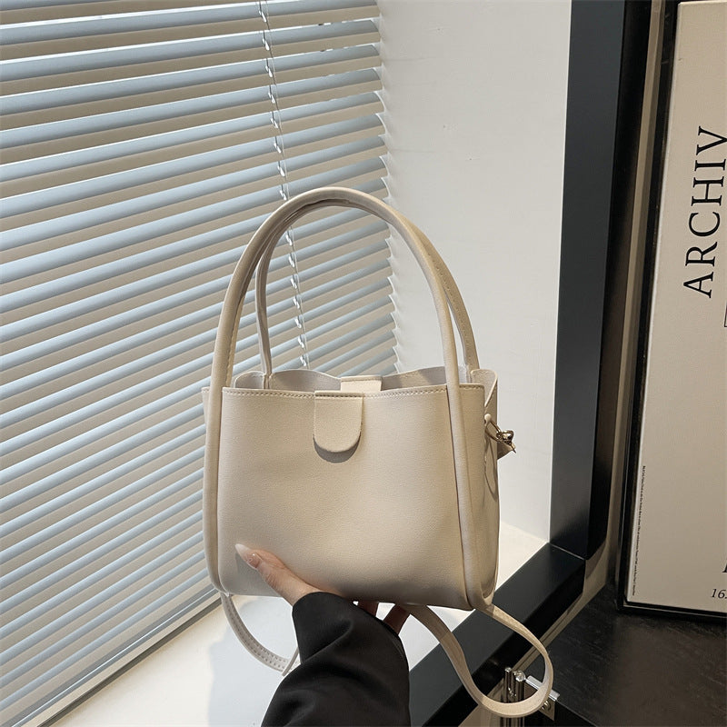 Ladies elegant mini handbag with practical flap closure