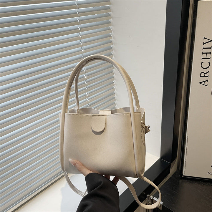Ladies elegant mini handbag with practical flap closure