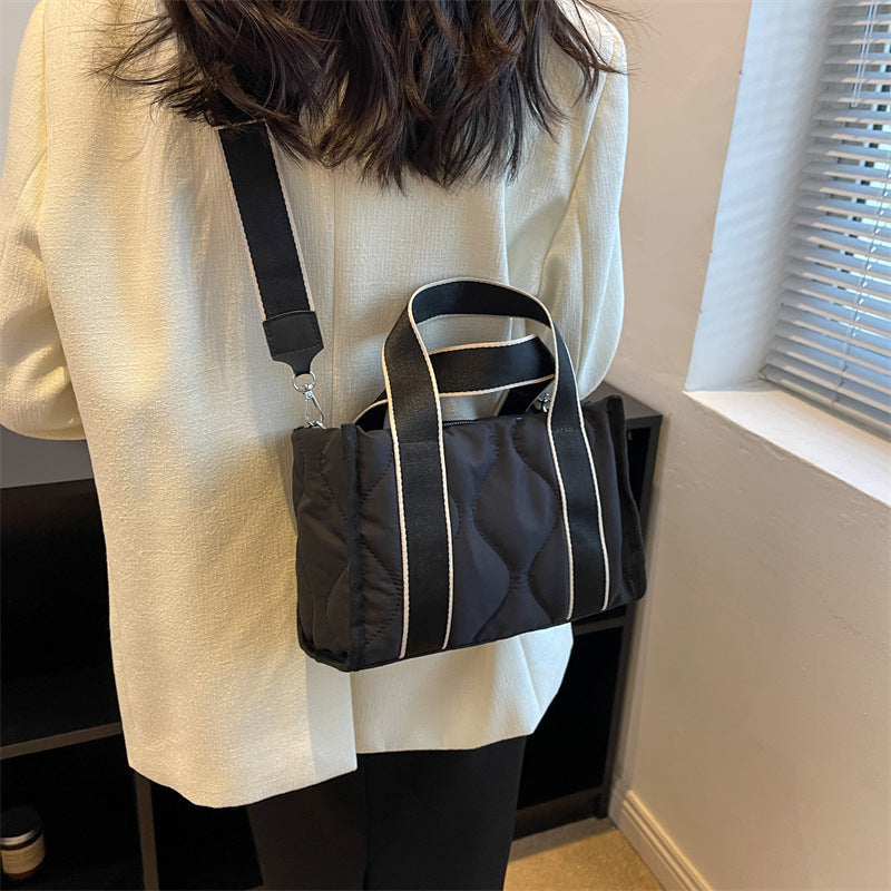 Women's practical shoulder bag with structured details