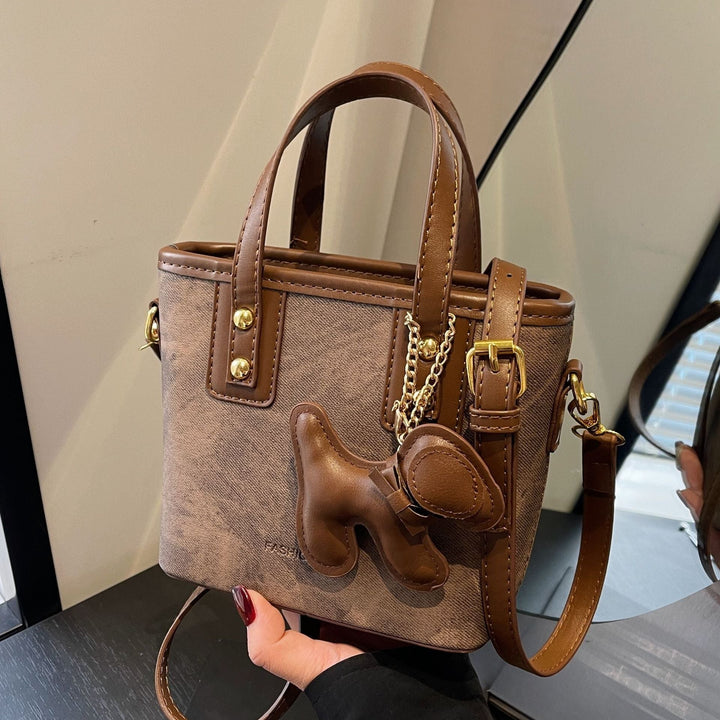 Women's mini bag made of high-quality material with removable funny charm