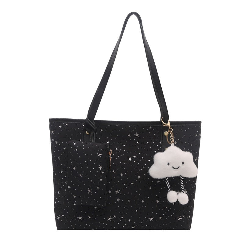 Women's large tote bag with sparkling star design and detachable cosmetic pouch