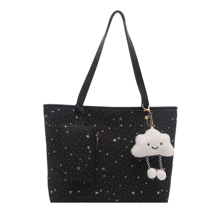 Women's large tote bag with sparkling star design and detachable cosmetic pouch