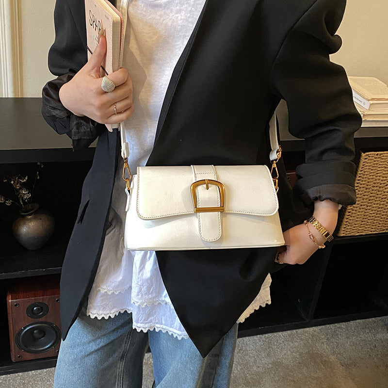Women's shoulder bag with detachable strap and elegant closure