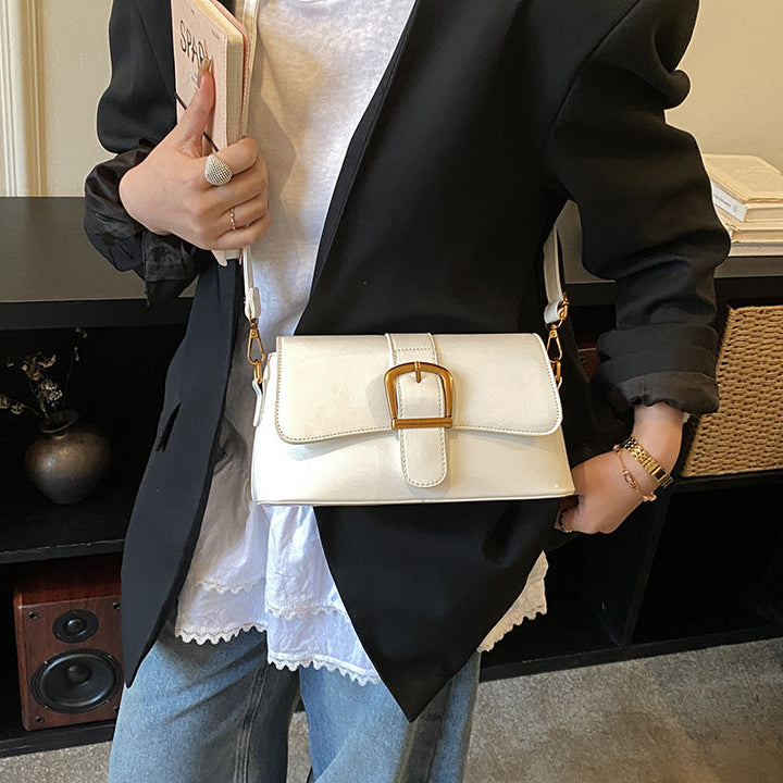 Women's shoulder bag with detachable strap and elegant closure