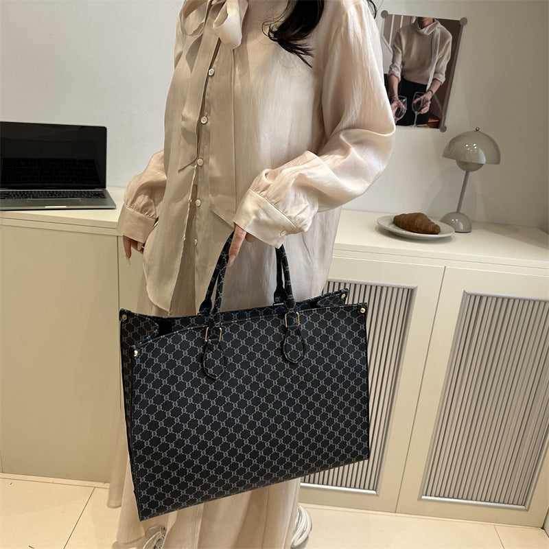 Women elegant tote bag with high-quality monogram design
