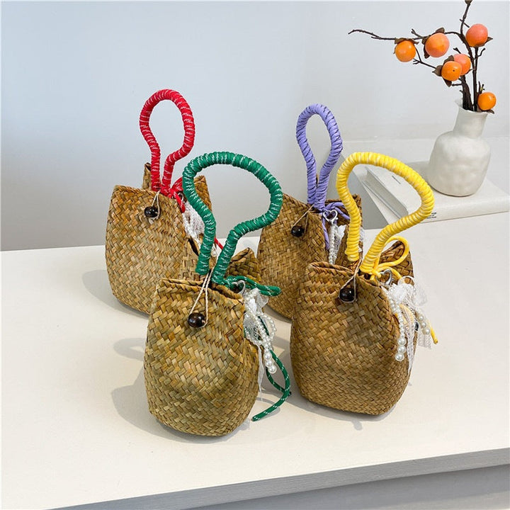 Women's hand-woven shoulder bag with decorative drawstring