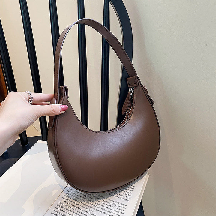 Women elegant shoulder bag with modern accents