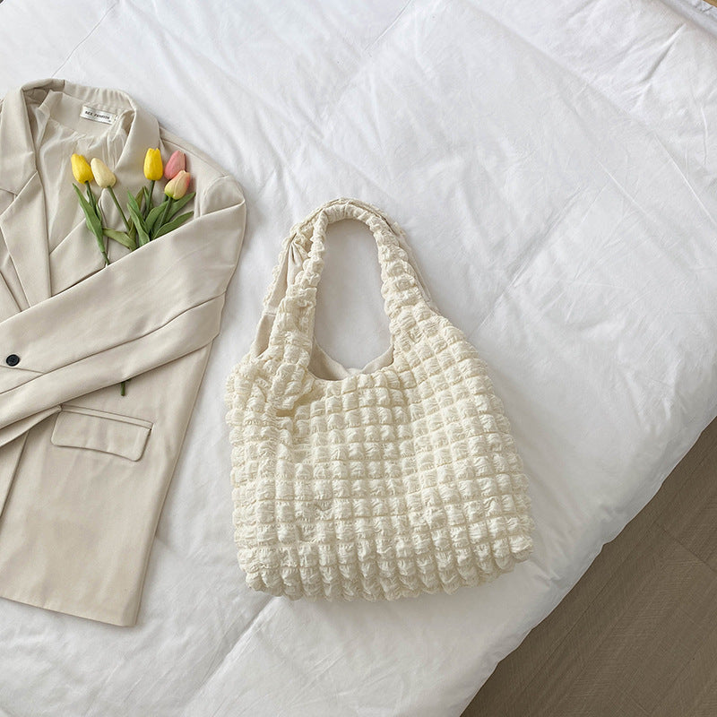Women's tote bag with structured design
