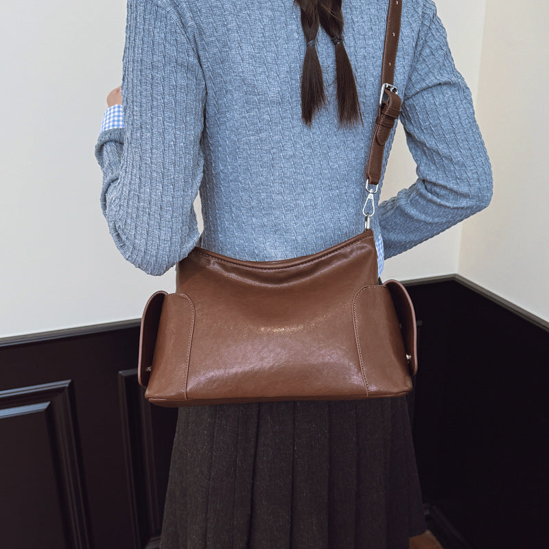Women's shoulder bag made of high-quality synthetic leather with a stylish design