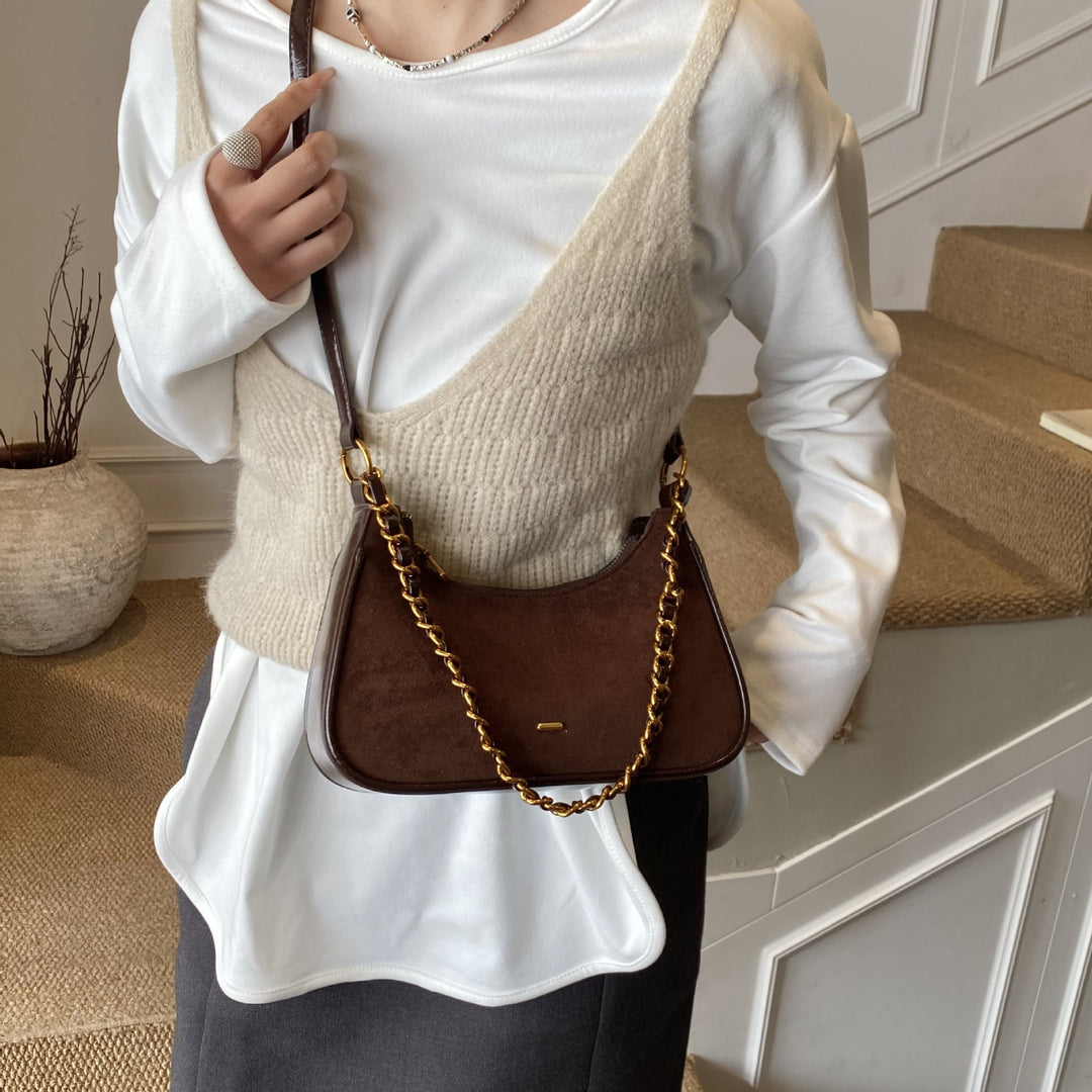 Women's fashionable shoulder bag in vintage look with chain strap