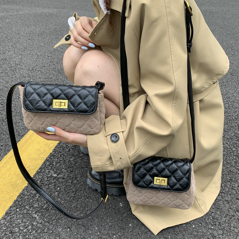 Women elegant shoulder bag with matte finish and textured design