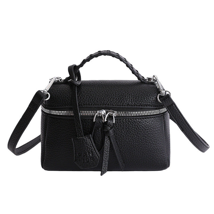 Women's mini handbag with fine decorative seams and detachable shoulder strap