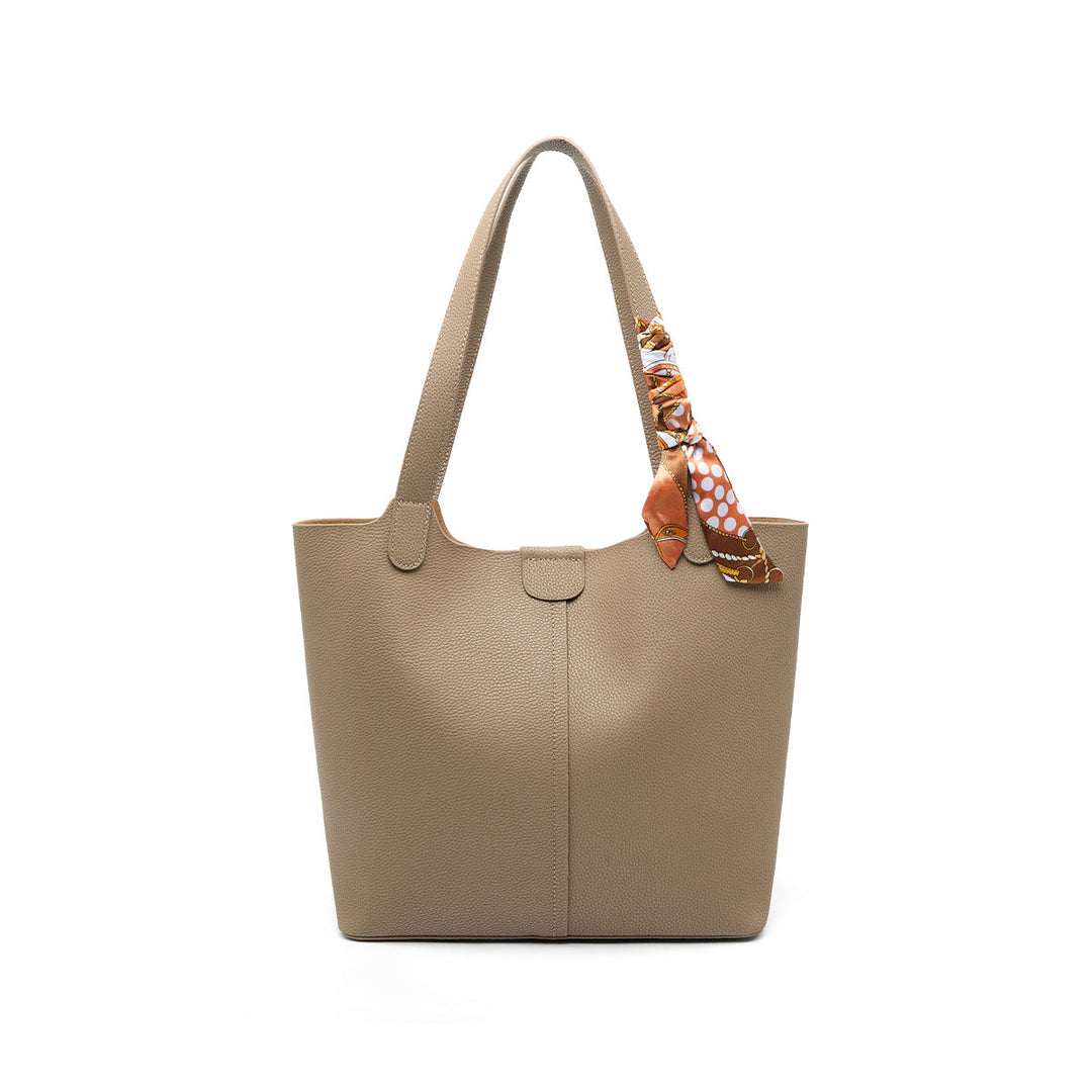 Women’s fashionable tote bag with detachable bow accessory