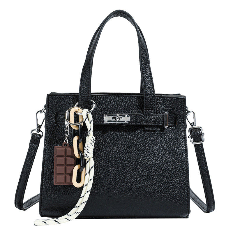 Ladies elegant mini bag with detachable pendant