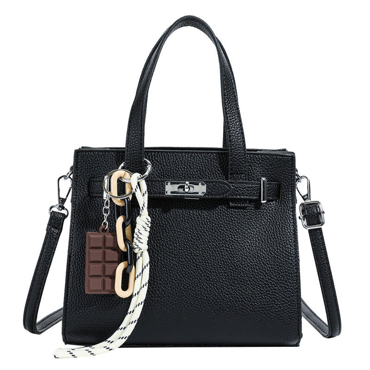 Ladies elegant mini bag with detachable pendant