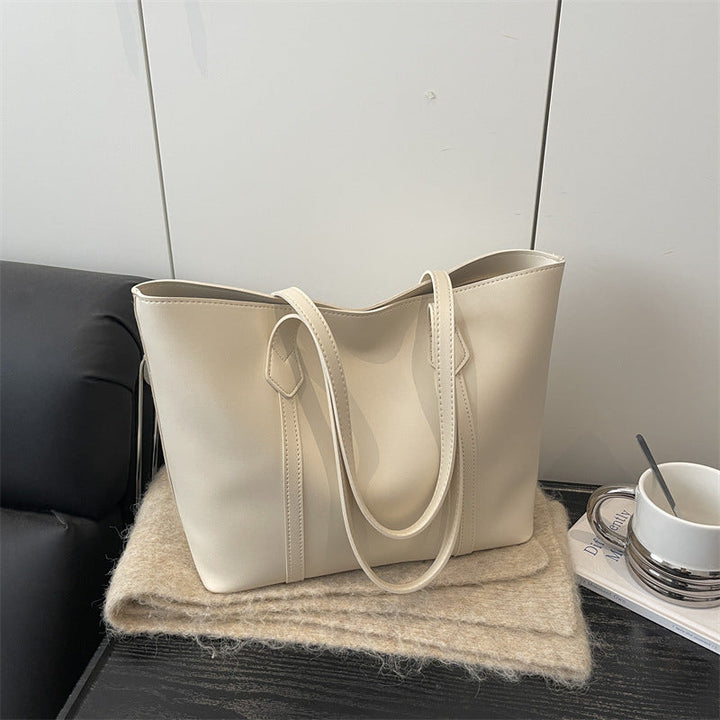 Women's elegant tote bag with minimalist structure