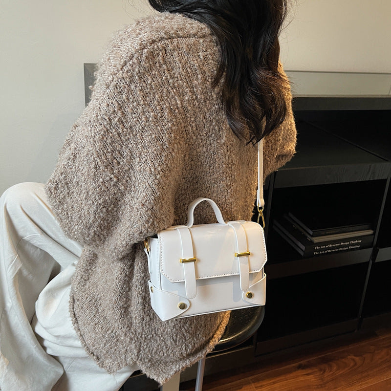 Women's mini handbag with textured design and detachable shoulder strap