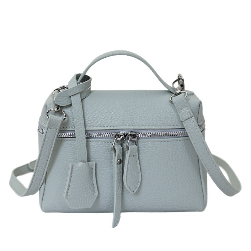 Women's practical shoulder bag with double zipper and versatile carrying strap