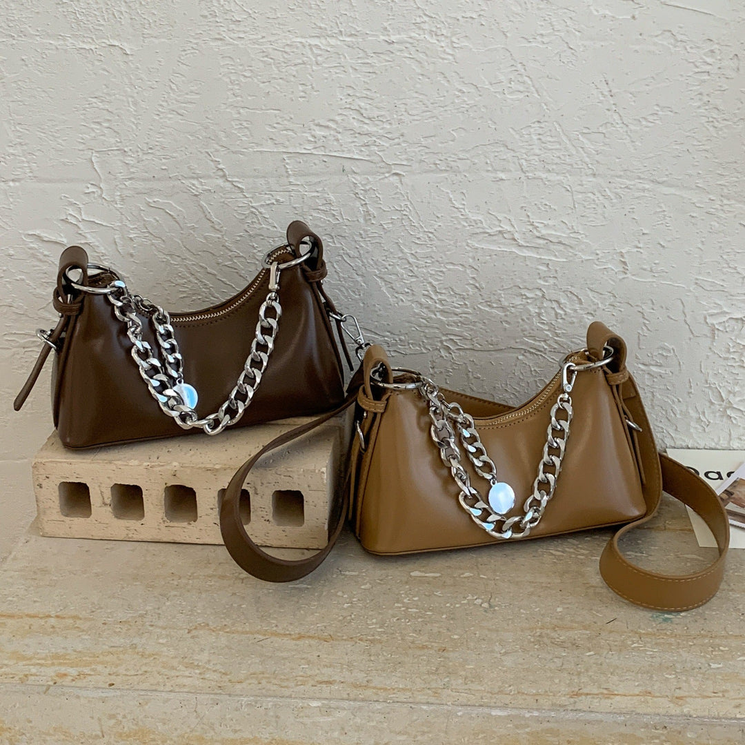 Women's fashionable shoulder bag with sparkling chain accent