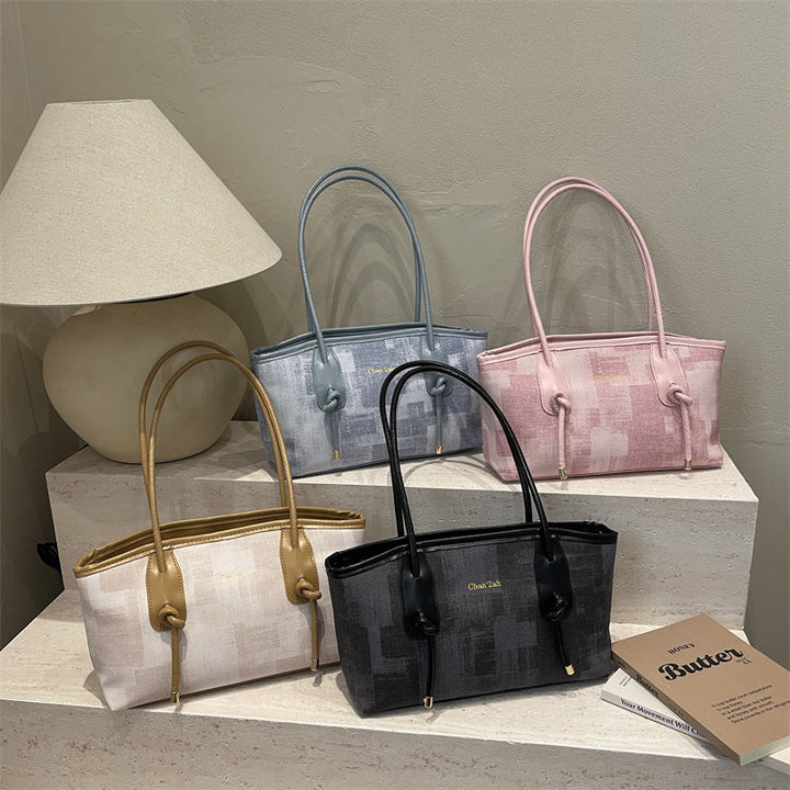 Ladies elegant tote bag with textured material