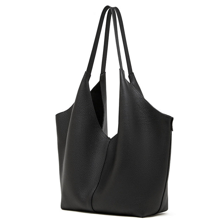 Women's tote bag in modern minimalist design with spacious interior layout