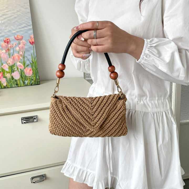 Ladies fashionable braided shoulder bag with wooden handle