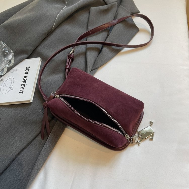 Women's practical shoulder bag made of high-quality suede leather