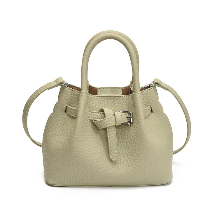 Women's mini handbag with stylish button closure