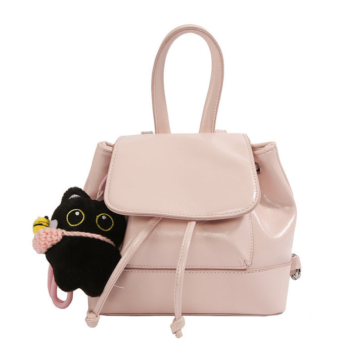 Women's mini backpack with playful pendant