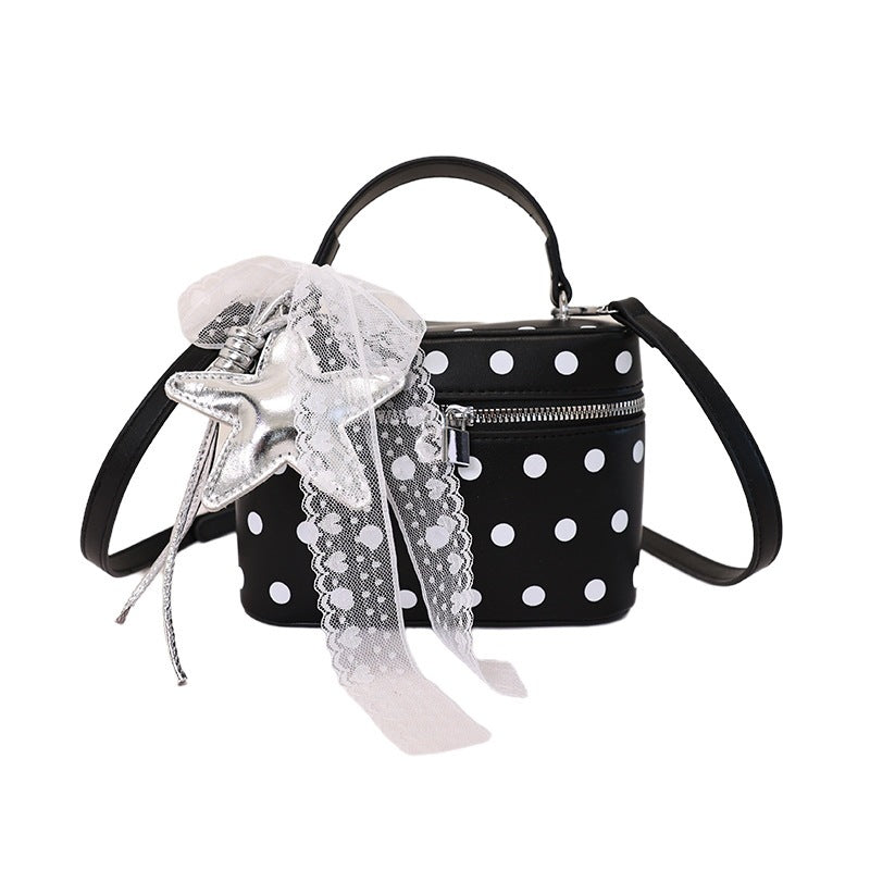 Women's mini handbag with playful design and elegant accents