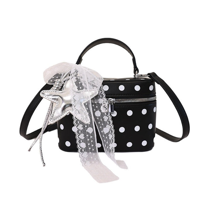 Women's mini handbag with playful design and elegant accents