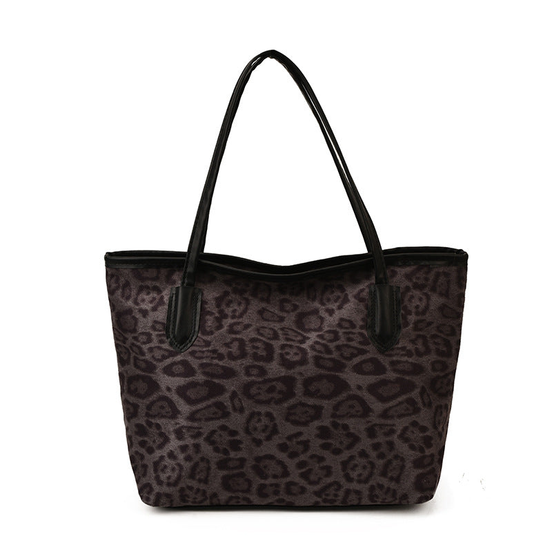 Women's tote bag with modern leopard pattern and sturdy carrying handles