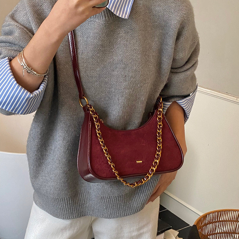 Women's fashionable shoulder bag in vintage look with chain strap
