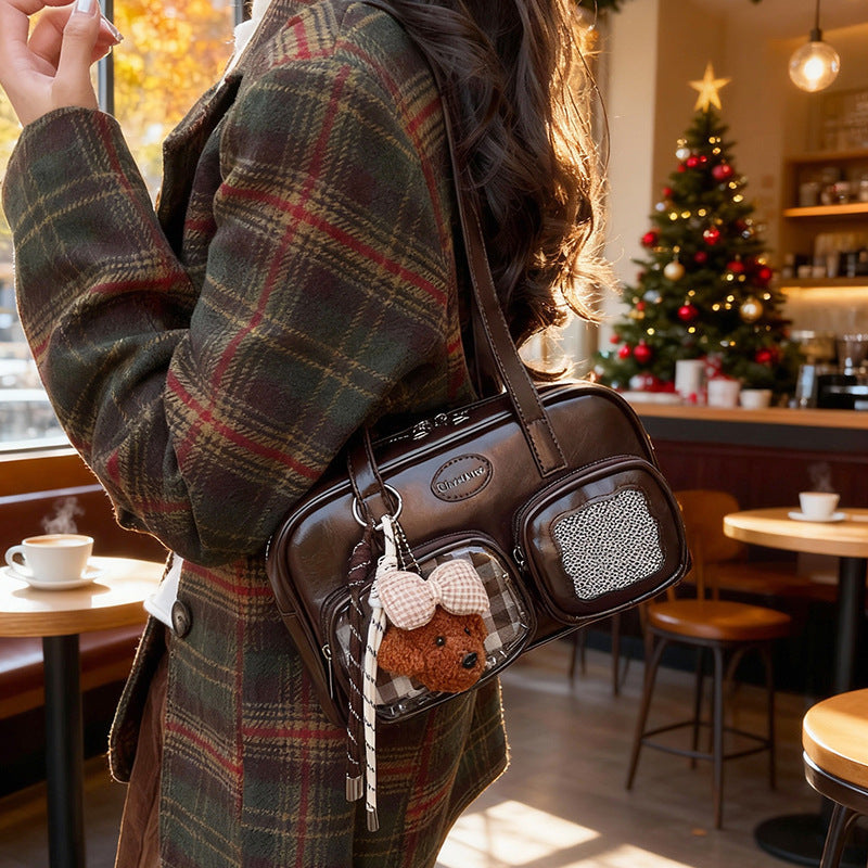 Women's shoulder bag with unique drawstring and charming pendant