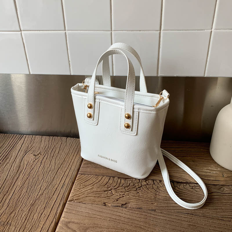 Ladies Mini-Handbag with elegant carry handle and practical inner compartment