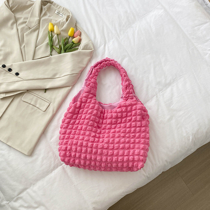 Women's tote bag with textured design