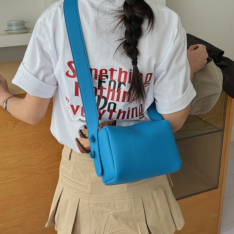 Women’s shoulder bag in modern design with structured surface